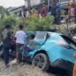 Kecelakaan kereta Bekasi Timur melibatkan sopir taksi yang baru dua hari bekerja. Polisi masih menyelidiki penyebab dan belum menetapkan tersangka.( Poto : liputan6.com/Rifqi Alief Abiyya).