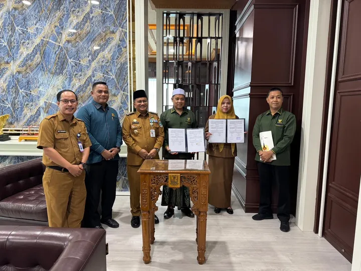 Pemkot Jambi dan Baznas memperkuat layanan kesehatan gratis bagi warga tidak mampu melalui MoU.( Poto : Kalangan Jambi.com ).
