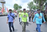 Riuh suara mesin dan sorakan penonton menggema di sirkuit non permanen kawasan Tugu Keris Siginjai, Kotabaru, Kota Jambi, Sabtu (2/5/2026).( Poto :  JAMBIlink ).