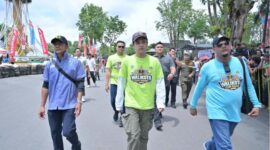 Riuh suara mesin dan sorakan penonton menggema di sirkuit non permanen kawasan Tugu Keris Siginjai, Kotabaru, Kota Jambi, Sabtu (2/5/2026).( Poto :  JAMBIlink ).