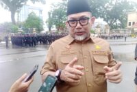 Bank Jambi menargetkan layanan mobile banking kembali normal pada Mei 2026 setelah serangan siber.( Poto : jambi-independent.co.id ).