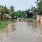 Warga Simpang 4 Sipin, Telanaipura, Kota Jambi mengeluhkan banjir yang terus berulang selama puluhan tahun tanpa penanganan tuntas.( Poto : KOMPAS.COM )