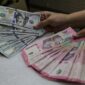 Rupiah melemah ke Rp17.529 per dolar AS akibat ketidakpastian data ekonomi domestik dan penguatan dolar AS di tengah meningkatnya risiko geopolitik global.( Poto : KOMPAS.com ).