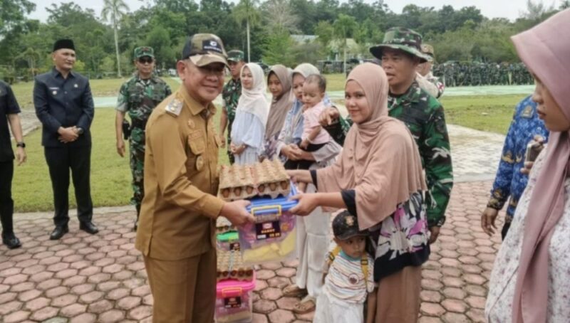 Danrem 042/Gapu Brigjen TNI Nyamin dan Wakil Bupati Merangin A. Khafidh.( Poto : jambiprima.com ).
