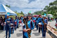 Drum band pelajar meriahkan Hardiknas 2026 di Kerinci. SMPN 7 Kerinci tampil menonjol dengan atraksi kompak, energik, dan penuh kreativitas.( Poto : JAMBIHARIINI.COM ).