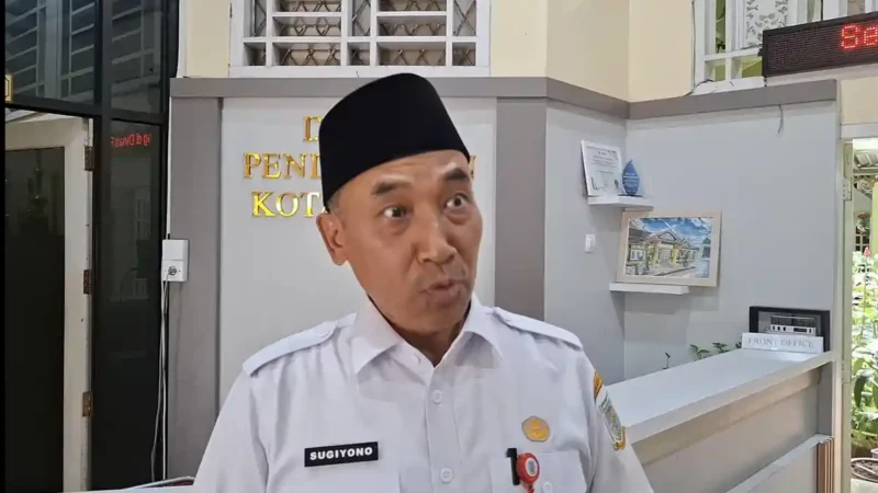 Dinas Pendidikan Kota Jambi menegaskan seluruh guru di sekolah negeri wajib berstatus ASN, baik PNS maupun PPPK.( Poto : Tribun Jambi.com ).