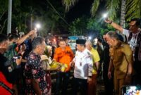 Gubernur Jambi Al Haris meninjau banjir Merangin 2026 di Desa Pulau Bayur, menyalurkan bantuan, dan mempercepat penanganan.( Poto : BERITA SATU).
