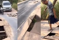 Tangkapan layar Sebuah video yang memperlihatkan kondisi mengenaskan sebuah jembatan besi di kawasan Jalan Darma Mala, Sungai Gelam, Kabupaten Muaro Jambi.( poto : tribunjambi.com )