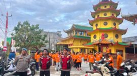 Polsek Tungkal Ilir amankan jalan santai Waisak di Vihara Budhayana Kuala Tungkal, Kecamatan Tungkal Ilir, Kabupaten Tanjung Jabung Barat, Minggu (7/6/2026) pagi.( poto : jambiprima.com )