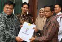 Sekretaris Daerah (Sekda) Merangin, Zulhifni memaparkan Pemerintah Kabupaten Merangin meresmikan operasional Depo Pomindo pertama di Provinsi Jambi, Kamis (18/6/2026).( poto : tribunjambi.com )