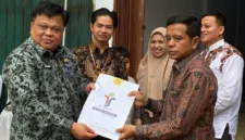 Sekretaris Daerah (Sekda) Merangin, Zulhifni memaparkan Pemerintah Kabupaten Merangin meresmikan operasional Depo Pomindo pertama di Provinsi Jambi, Kamis (18/6/2026).( poto : tribunjambi.com )