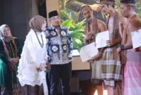Drs. H. Anwar Sadat, M.Ag., menghadiri Festival Raden Hamzah 2026 bertema Rimba yang Bersuara di Aula Kantor RRI Telanai, Jambi, Sabtu malam (27/6/2026).( poto : tribunjambi.com )