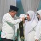 Gubernur Jambi Dr H Al Haris, S.Sos., M.H., menghadiri Acara ini berlangsung di Desa Pinang Merah, Kecamatan Pamenang Barat, Kabupaten Merangin, Sabtu (13/6/2026) malam.( poto : jambilink.id )