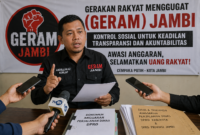 Gerakan Rakyat Menggugat (GERAM) Jambi berencana melaporkan dugaan penyimpangan anggaran perjalanan dinas DPRD Jambi ke Polda Provinsi Jambi( poto : chatGPT )