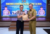 Kepala Dinas Komunikasi dan Informatika Provinsi Jambi, Drs Ariansyah, M.E.( kiri ).poto : jambilink.id