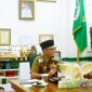 Asisten I Setda Batang Hari, M. Rifa'i bersama dua pejabat lainnya diacara peningkatan kapasitas Satlinmas di Muara Bulian, Rabu (8/7/2026).( poto: ANTARA).
