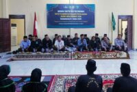Jajaran PCNU, Kapolres Tebo, pengurus, dan peserta mengikuti Tasyakuran serta Doa Bersama dalam rangka Wisuda Santri dan Pengukuhan Anggota Kehormatan Pagar Nusa Cabang Tebo.(poto: jambiprima.com).