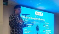 Dr. Pahmi SY, M.Si., memberikan sambutan sekaligus membuka kegiatan Peningkatan Kompetensi Bendahara di Amphiteater Lantai 4 Gedung Rektorat UIN STS Jambi, Rabu (22/7/2026).(poto: jambiprima.com).