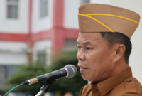 Sekretaris Daerah Kota Sungai Penuh Alpian memimpin Upacara Hari Anak Nasional 2026 di lingkungan Pemerintah Kota Sungai Penuh pada Senin pagi.(poto: istimewa).