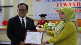 Iswandi, S.H., M.H., dosen tetap Program Studi Ilmu Hukum Fakultas Hukum Universitas Jambi, resmi menyandang gelar doktor ilmu hukum.(poto: jamberita.com)