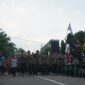 Ribuan warga memadati kawasan Makodim 0415/Jambi untuk mengikuti kegiatan jalan santai pada Minggu (26/7/2026).(poto: jamberita.com)