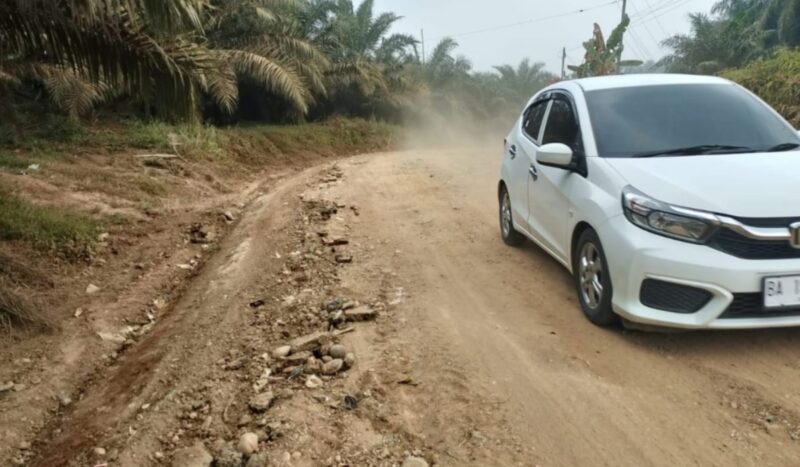 Perbaikan jalan Kabupaten Merangin di Desa Rasau dan Selango disambut gembira warga.(poto: meranginkab.go.id).