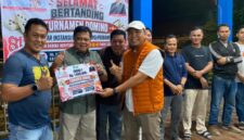Sekretaris Daerah Merangin Zulhifni bersama pasangannya Deni Auriza sukses mengamankan gelar juara pertama pada Turnamen Domino HUT RI ke-81.(poto: seriusnews.id).