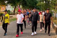 Bupati Merangin M Syukur mengisi agenda akhir pekan dengan memimpin kegiatan jalan santai dan jogging bersama sejumlah anggota DPRD Kabupaten Merangin pada Minggu.(poto: meranginkab.go.id).