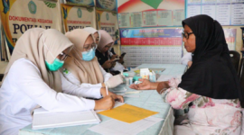 Sekretaris TP PKK Kota Sungai Penuh, Firna Dianda, menghadiri peluncuran pembinaan Posyandu berbasis Enam Standar Pelayanan Minimal (SPM) di Desa Aur Duri, Kecamatan Pondok Tinggi, Rabu (12/8/2026).(poto: istimewa).