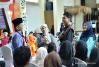 Wali Kota Jambi Maulana menghadiri peringatan Hari Anak Nasional ke-42 di Aula Griya Mayang, Jumat (7/8/2026).(poto: jambilink.id).