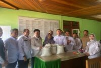 Pemerintah Kabupaten Merangin menyalurkan bantuan beras pangan alokasi tiga bulan sekaligus sebanyak 1.174 ton untuk 39.152 KPM di Pematang Kandis.(poto: kominfo).