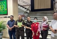 Tim Gabungan Tangkap Buronan Kejaksaan Tinggi Jambi meringkus seorang buronan kasus perzinahan bernama Yuliani AF alias Lina binti M. Yunus.(poto: jamberita.com).