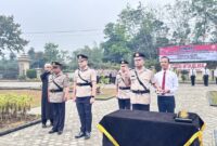 Kapolres Muaro Jambi AKBP Bayu Noormansyah, S.H., S.I.K., M.H., memimpin upacara sertijab Polres Muaro Jambi di Lapangan Apel Kepolisian Resor Muaro Jambi.(poto: tribratanews.jambi).