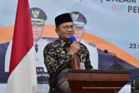 Wali Kota Jambi Dr. dr. H. Maulana, M.K.M, saat memberikan meteri di hadapan ratusan anggota BPD se-kota Sungai Penuh di Grand Hotel Jambi, Jumat (25/9/2026).(poto: istimewa).