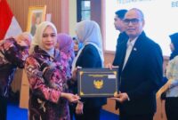 Kepala Divisi Pelayanan Hukum Kantor Wilayah Kementerian Hukum Jambi, Diana Yuli Astuti, menuntaskan program PKN Tingkat II Kemenkum pada Kamis (15/10/2026).(poto: jambiprima.com).