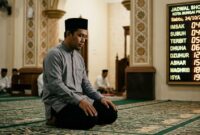 Ilustrasi Sore hari tenang di sebuah masjid Kota Sungai Penuh, warga khusyuk sholat dekat jadwal digital 24 Oktober 2026.(poto: AI).