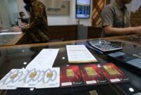 Ilustrasi: Emas batangan Antam di butik Logam Mulia, Jakarta. Transaksi terpantau stabil, lengkap dengan rincian harga dan pajak.(poto: AI).