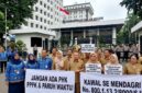 Ilustrasi: Perwakilan GTKN dan aparatur daerah mengawal implementasi larangan pemutusan hubungan kerja bagi PPPK selama masa transisi.(poto: AI).