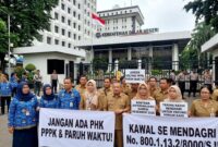 Ilustrasi: Perwakilan GTKN dan aparatur daerah mengawal implementasi larangan pemutusan hubungan kerja bagi PPPK selama masa transisi.(poto: AI).