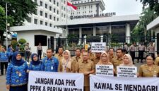 Ilustrasi: Perwakilan GTKN dan aparatur daerah mengawal implementasi larangan pemutusan hubungan kerja bagi PPPK selama masa transisi.(poto: AI).
